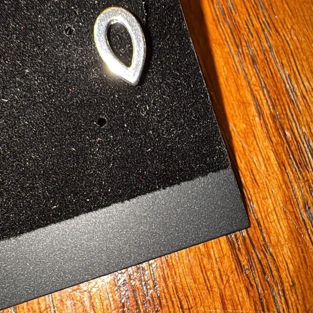 Polaris stud earrings asymmetrical design by nOIr jewelry collection